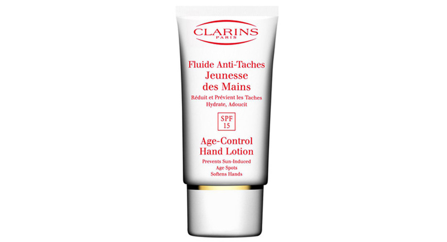 Омолаживающий лосьон для рук против пигментных пятен Clarins Fluide Anti-Taches Jeunesse des Mains SPF15, защищает от пигментации и осветляет уже имеющиеся пятна, 480 грн., www.letu.ua